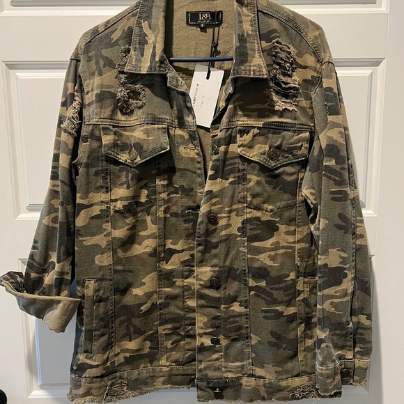 Lucky & Blessed Jackets & Blazers - Camo distressed denim jacket from Lucky & Blessed